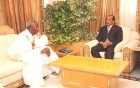 عزيز ومسعود في لقاء سابق 